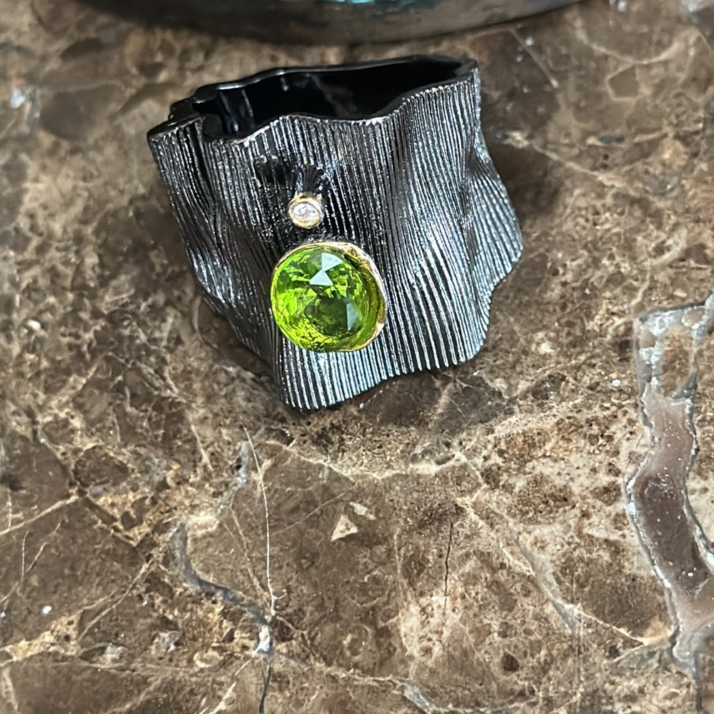 Large designer ring stamped inside green peridot size 8/9